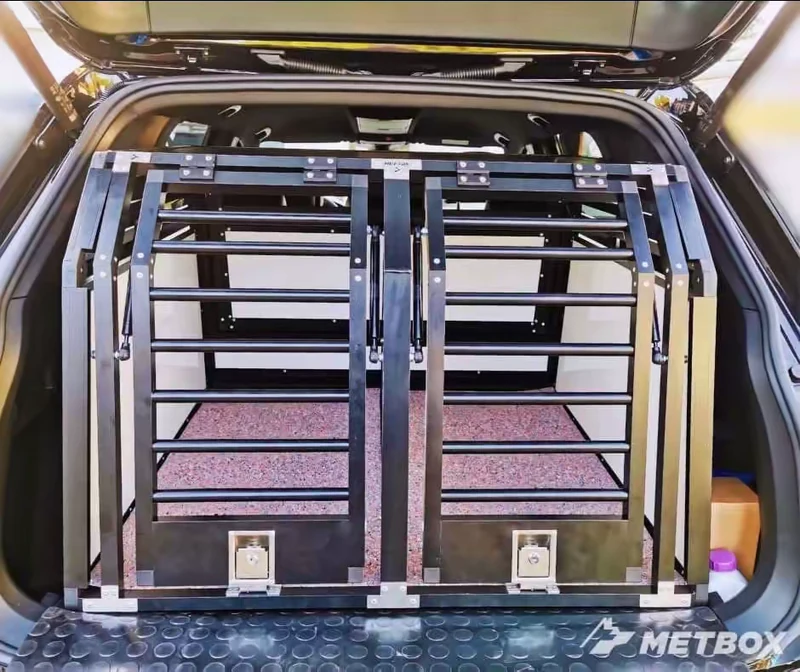 METBOX USA black dual dog crate installed in a vehicle