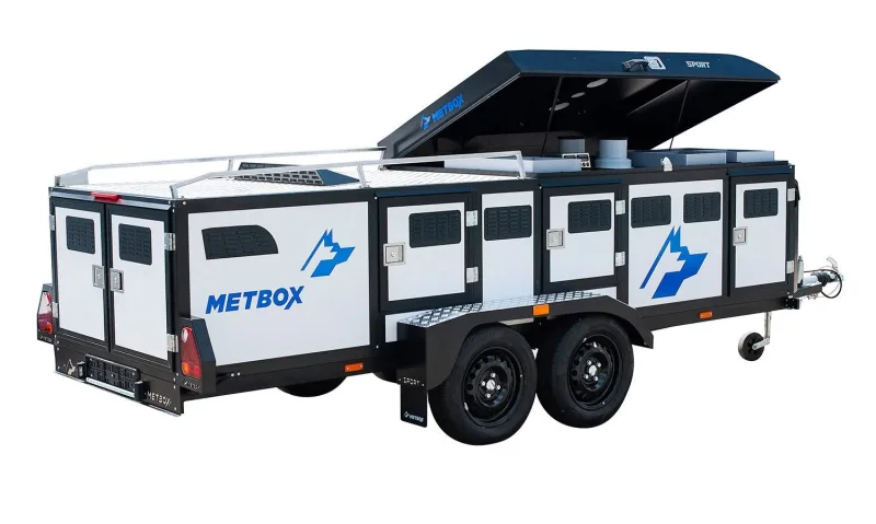 METBOX Sport multi-door dog transport trailer on white background, open roof storage