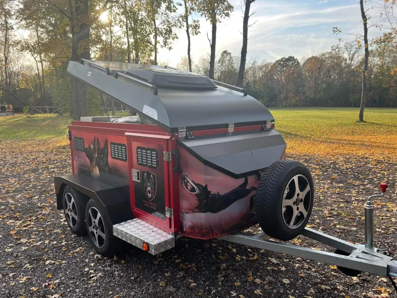 Waldweg red K9 dog transport trailer with German Shepherd graphics and pop-up roof